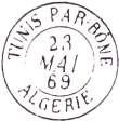 Timbre  date au type 15M avec mention : TUNIS PAR BNE ALGERIE